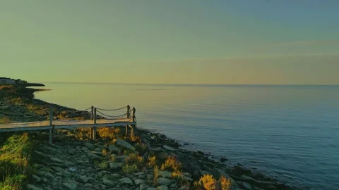 Drone Flight Rising Off The Shore Towards The Atlantic Ocean With Boardwalk Stock Footage 255350189