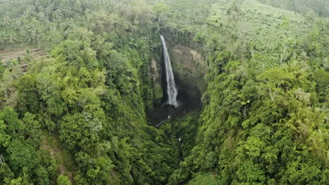 Drone Flight Rotating Over Edge Of Tumpak Sewu Waterfalls Stock Footage 146104332