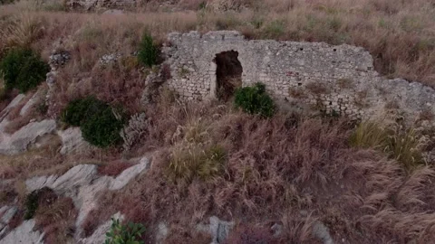 Drone flight to the ruined castle tower in Amantea Stock Footage 214280705