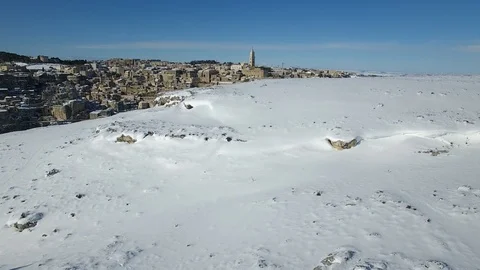 Drone flight Sassi of Matera with snow Video stock 106068209