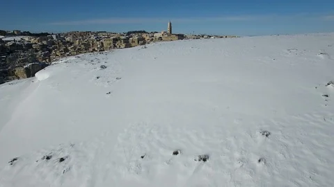 Drone flight Sassi of Matera with snow Video stock 106068224