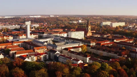 Drone flight sideways with view of St. Marien Kirche and Marktplatz-Center of Stock Footage 239107191