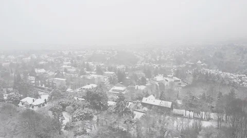 Drone flight in snow landscape, flying over town Stock Footage 102150876