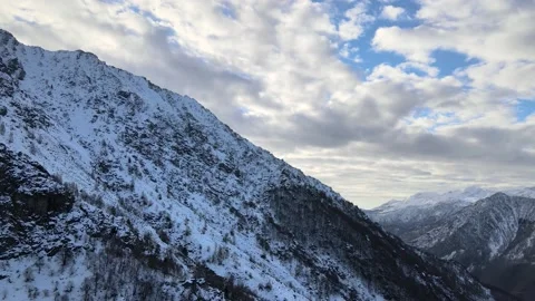 Drone flight in snowy mountain landscape. Italian Alps. Aerial video footage. 4K Stock Footage 148031455