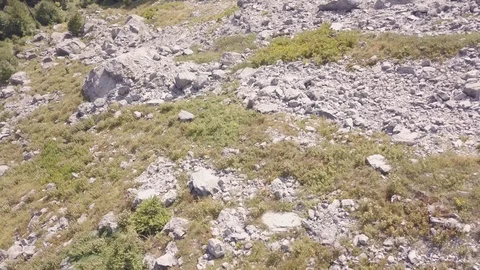 Drone flight start in a rocky terrain 스톡 동영상 97115461