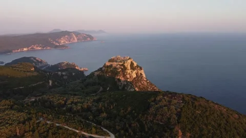 Drone flight at sunset over castello bizantino di angelokastro in corfu Stock Footage 313479598