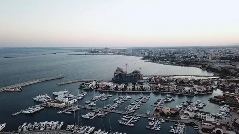 Drone flight at sunset over the Harbor of Limassol, luxury white yachts Video stock 121618604