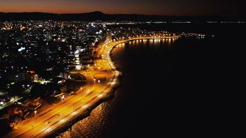 Drone flight at sunset over the seashore at Florianopolis, Santa Catarina, Stock Footage 129321372