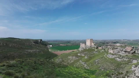 Drone flight taking off from a platform viewing the 9th century Oreja Stock Footage 275153346