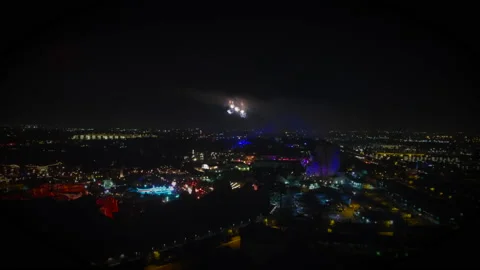 Drone Flight in Theme Park at Night with Fireworks Neon Lights Stock Footage 166712590