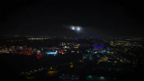 Drone Flight in Theme Park at Night with Fireworks Neon Lights Stock Footage 166712859