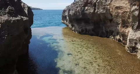 Drone Flight Through Angels Billabong Tide Pool Nusa Penida Bali Stock Footage 106787316