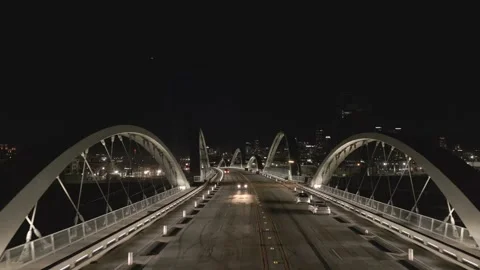 Drone flight through the arches of the Sixth Street Bridge at night Stock Footage 339303446