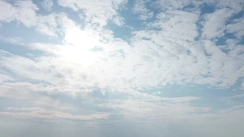 Drone flight through a bright, heavenly sky with sun rays and clouds. Stock Footage 312591234