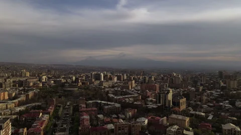 Drone flight through the city of Yerevan in Armenia with a view of Mount Ararat. Stock Footage 246953151