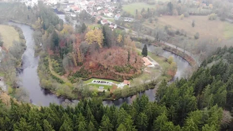 Drone flight through the clouds over the autumn forest and the river Stock Footage 144451946