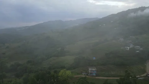 Drone flight through the clouds overlooking the Nepalese valley. Stock Footage 244712642