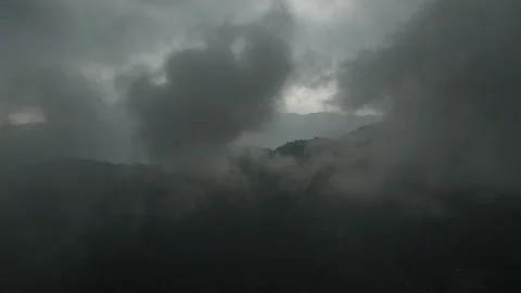 Drone flight through dark clouds before a storm in Nepal. Stock Footage 244563422