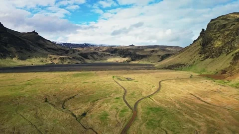 Drone flight through dramatic green mountain valley Iceland 4K Stock Footage 344114034