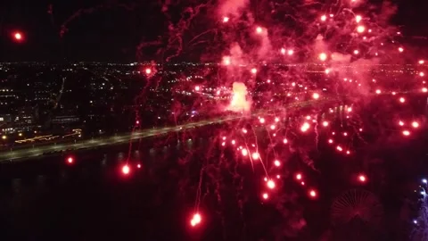 Drone flight through holiday fireworks above water with reflection on the black Stock Footage 279919006