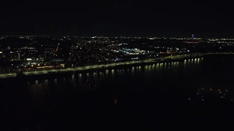Drone flight through holiday fireworks above water with reflection on the black Stock Footage 346505719
