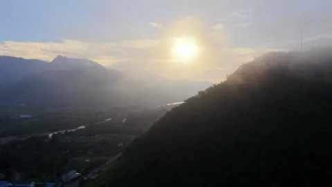 Drone Flight Through Mountain Mist at Sunrise Stock Footage 336857212