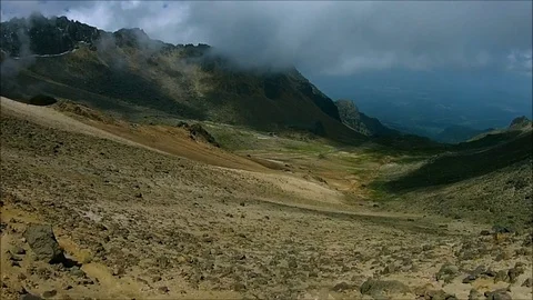 Drone flight through mountain pass 1080p HD Video stock 92804007