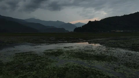 Drone flight through the Nepal Valley near Phewa Lake. View of the Nepal. Stock Footage 244723321