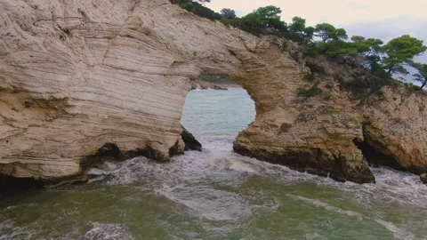 Drone Flight Through Sea Rock Arch Stock Footage 220804782