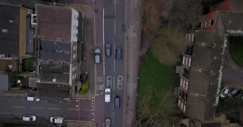 Drone flight, top down, following traffic on city street in London England. Stock-Footage 85443051