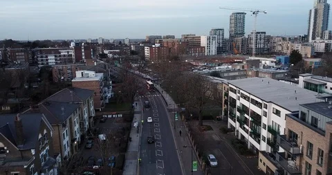 Drone flight, top down, following traffic on city street in London England. Stock-Footage 86009482