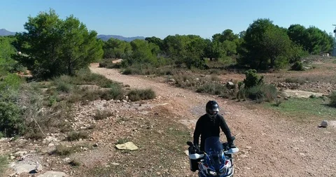 Drone flight on top of motorcycle circuit of large displacement ground circuit Stock Footage 124364741