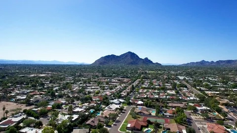 Drone flight toward Camelback Mountain Scottsdale Arizona Stock Footage 97145089