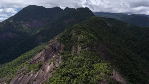 Drone Flight Toward a Dark Mountain as Storm Clouds Roll In Stock Footage 343806765