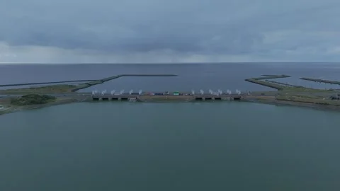 Drone flight toward the Lorentz Locks on the Afsluitdijk Stock Footage 343838913