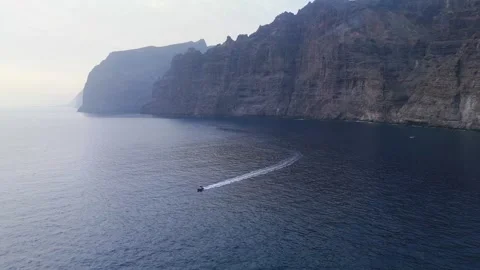 Drone Flight Toward Los Gigantes Cliffs with Boat Crossing, Tenerife, 4K Stock-Footage 314735360