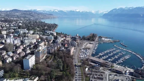Drone flight toward Ouchy harbor and Lake Geneva, Lausanne, Switzerland Stock Footage 329607605