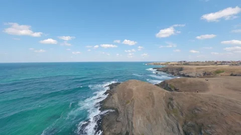 Drone flight toward rocky headland near Sinemorets on the Black Sea, Bulgaria. Stock Footage 342737313