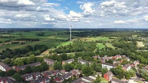 Drone Flight Toward Wind Turbine and Green Fields in Bremen, Germany Stock Footage 341696181