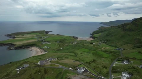 Drone flight towards a beach and headland at Muckross Head, Ireland Stock Footage 346745927