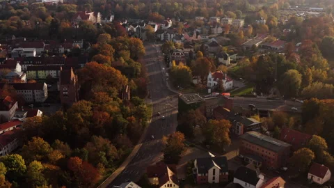 Drone flight towards a crossroad in front of the Treptower Tor of Stock Footage 239108099