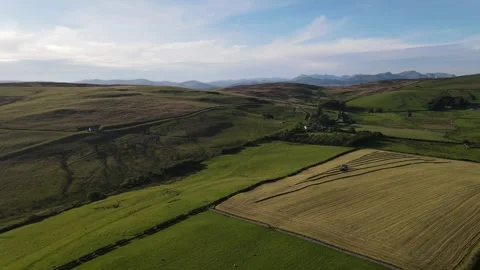 Drone Flight towards Lake District Over Agricultural Work Stock Footage 337774924