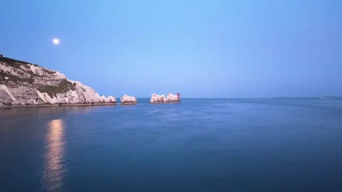 Drone Flight Towards The Needles with Full Moon Isle of Wight Stock Footage 338054891