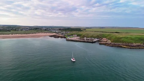 Drone Flight Towards Port Erroll Harbour, Cruden Bay Scotland Stock Footage 333202614