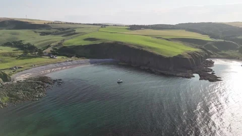 Drone Flight Towards Sailing Boat Anchored in Cullykan Bay Stock Footage 331301658