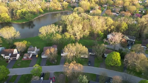 Drone flight towards a small lake Video stock 308337800