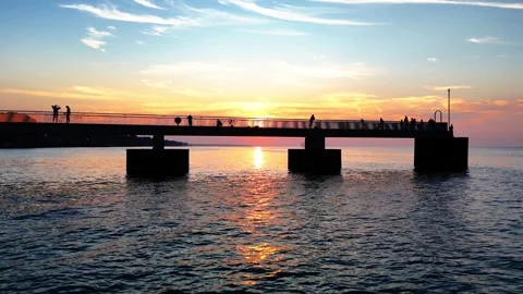 Drone Flight Towards Sunset Pier with Fishermen 库存影片 332160298