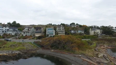 Drone flight tracks sea front road and cars Stock Footage 127002669