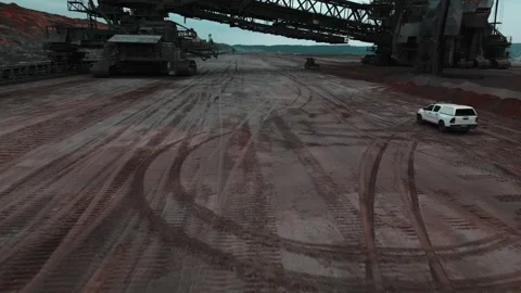 Drone Flight under Bucket Wheel Excavator in Hambach Mine Germany 動画素材 318694243