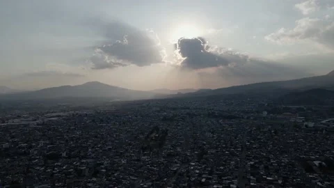 Drone Flight view in a city. Top view. Cityscape in sunset soft light. Stock Footage 150947833